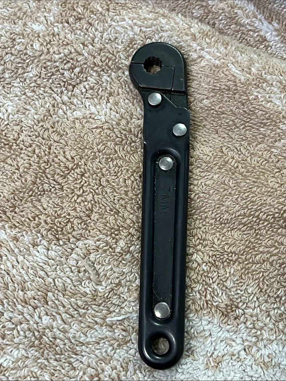 Black Adjustable Clipper Wrench for Men's Grooming Tools